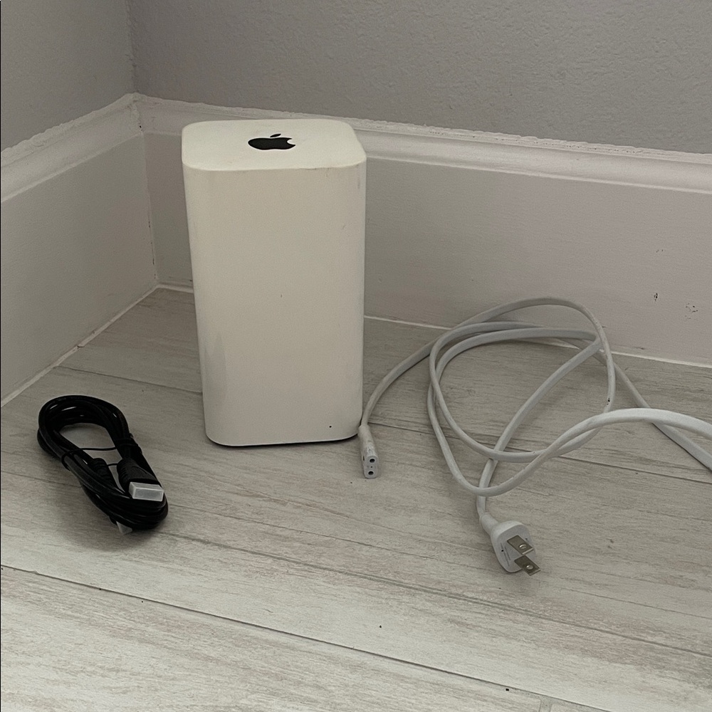 Apple White Network Airport discontinued Device with Cables